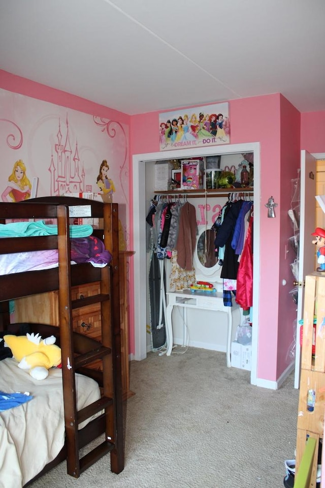 carpeted bedroom featuring a closet