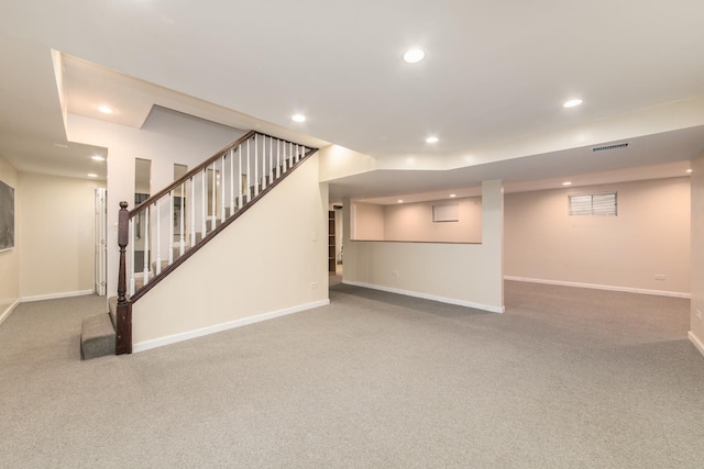 basement featuring carpet