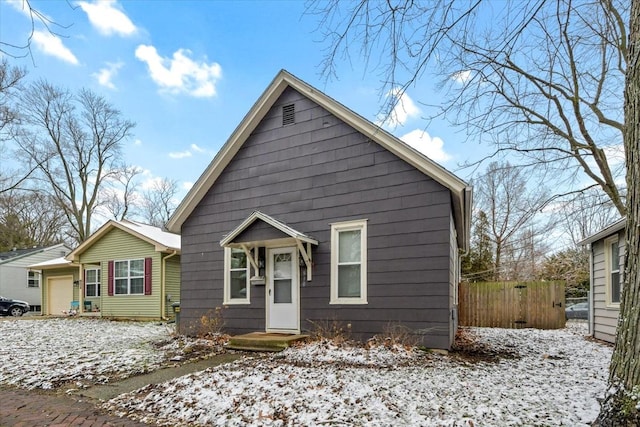 bungalow featuring a garage