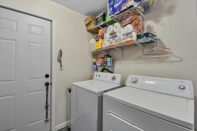 laundry room with independent washer and dryer