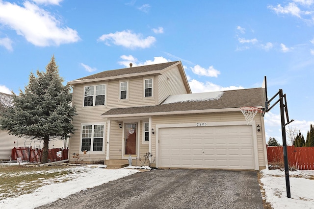 view of property with a garage