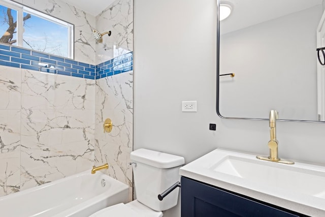 full bathroom featuring vanity, tiled shower / bath combo, and toilet