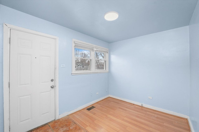 interior space with hardwood / wood-style flooring