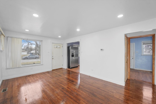 interior space with hardwood / wood-style flooring