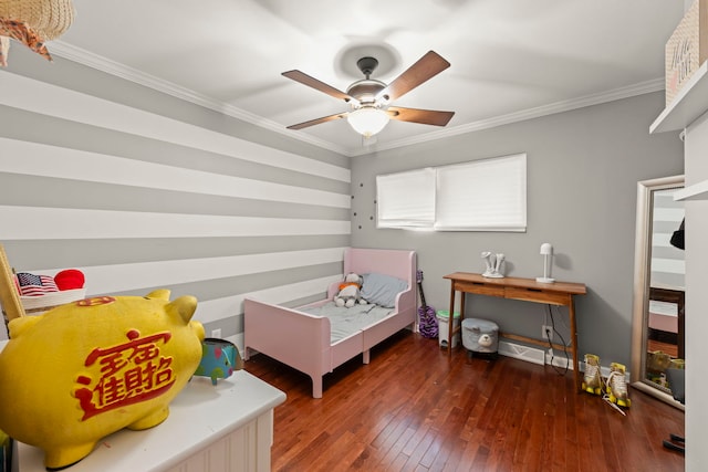 bedroom featuring dark wood-type flooring, ornamental molding, and ceiling fan