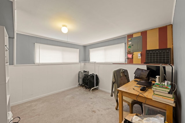 office area with light colored carpet and electric panel