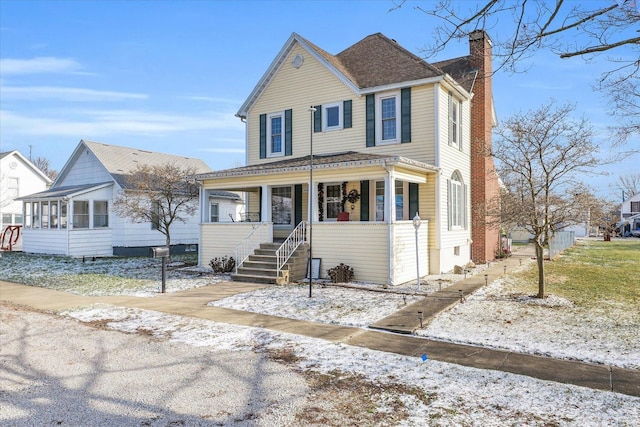 view of front of home featuring covered porch