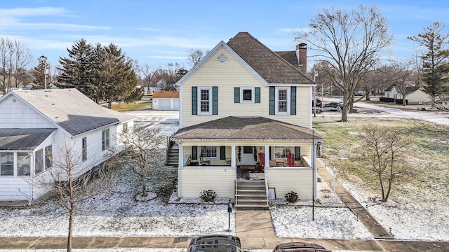 view of property with covered porch