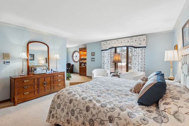 carpeted bedroom featuring crown molding