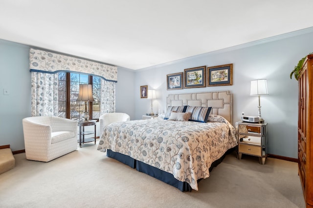 carpeted bedroom with crown molding