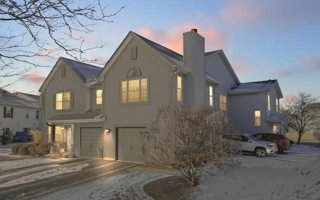 view of front of property with a garage