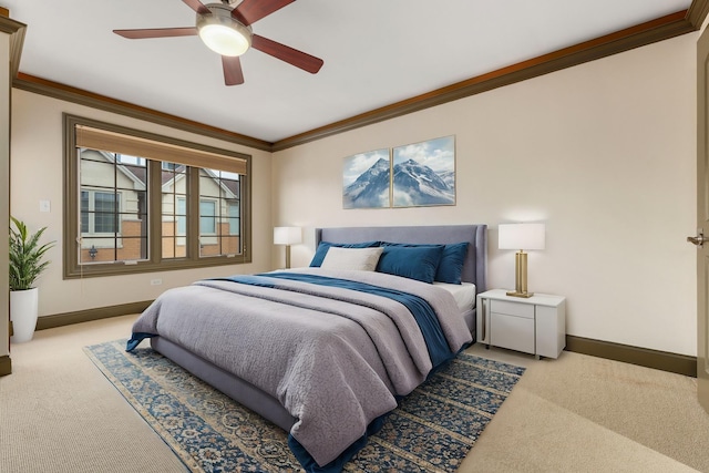 bedroom featuring crown molding, ceiling fan, and light colored carpet