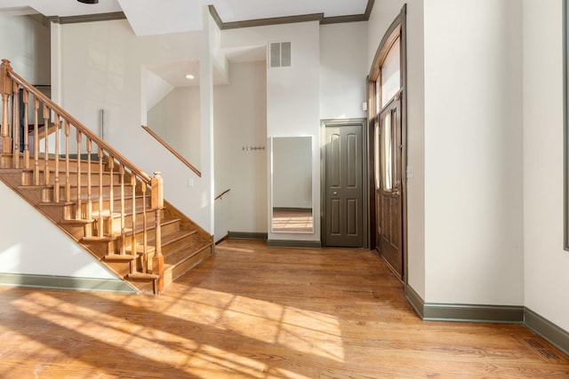 entryway with wood-type flooring