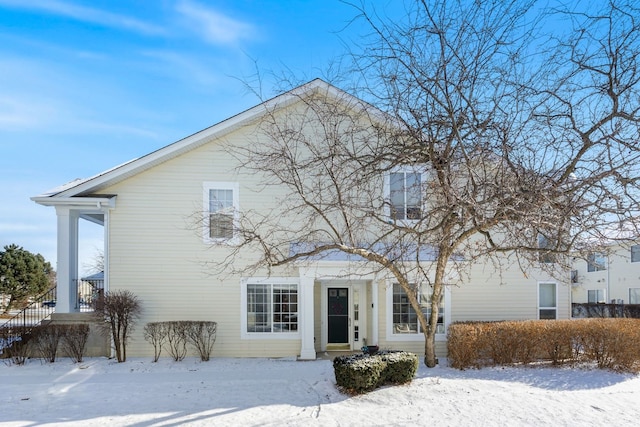 view of snow covered property