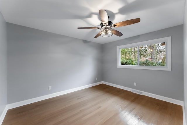 unfurnished room featuring ceiling fan and light hardwood / wood-style flooring