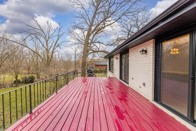 deck featuring a yard