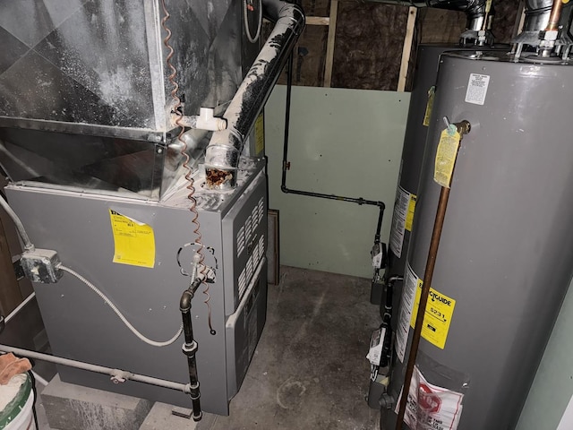 utility room featuring heating unit and water heater