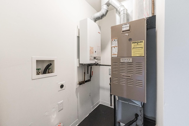 utility room with tankless water heater