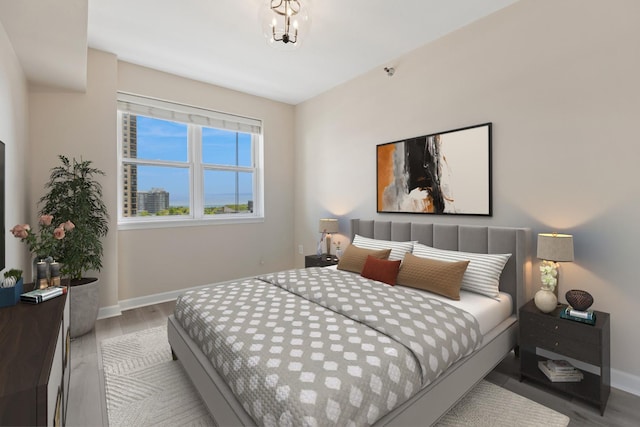 5 E 14th Pl Unit 801, Chicago, IL 60605 - bedroom with baseboards and wood finished floors