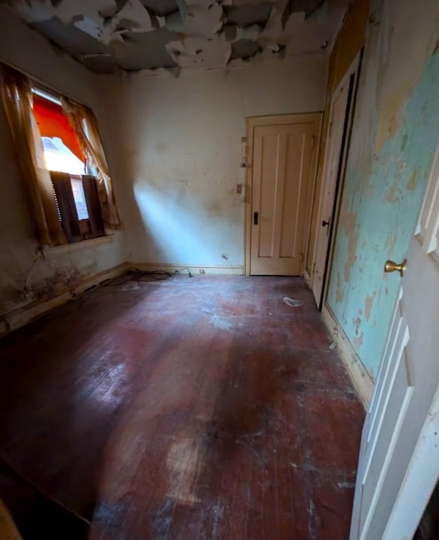 spare room featuring hardwood / wood-style flooring