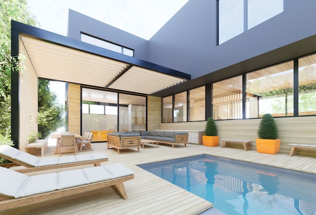 view of swimming pool with a wooden deck, outdoor dining area, a pergola, and an outdoor hangout area