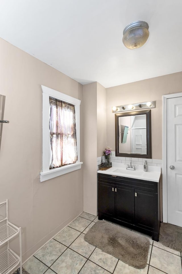 bathroom with vanity and tile patterned floors