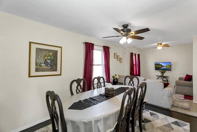 dining room featuring hardwood / wood-style flooring and ceiling fan