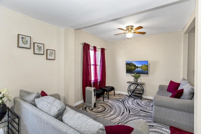 living room featuring ceiling fan