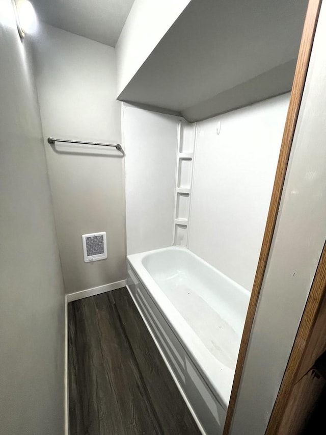 bathroom featuring wood-type flooring