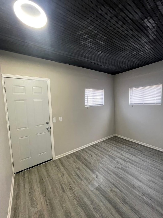 spare room with hardwood / wood-style flooring