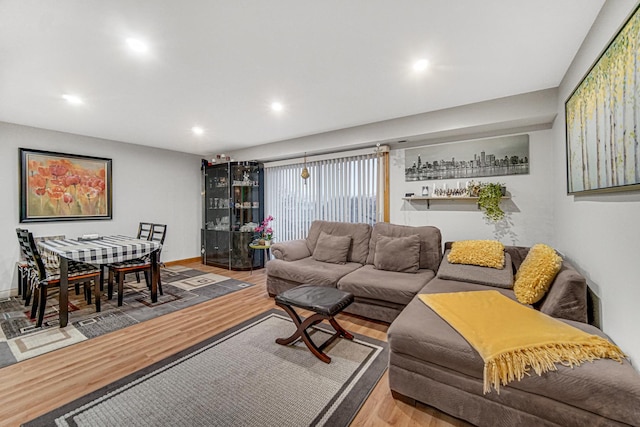 living room with light hardwood / wood-style floors