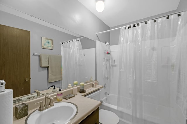 full bathroom with vanity, toilet, and shower / bath combo with shower curtain