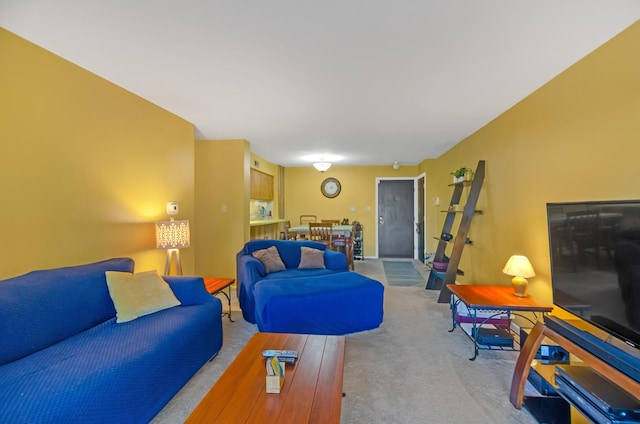 living room featuring light colored carpet