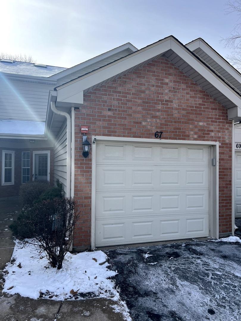 view of snow covered garage