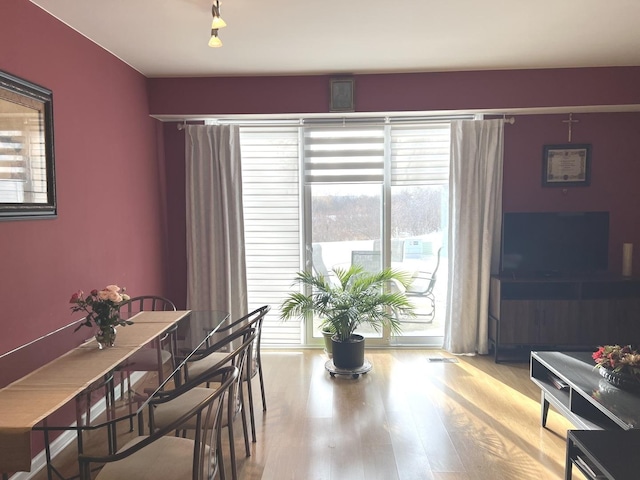 dining room featuring light wood-type flooring