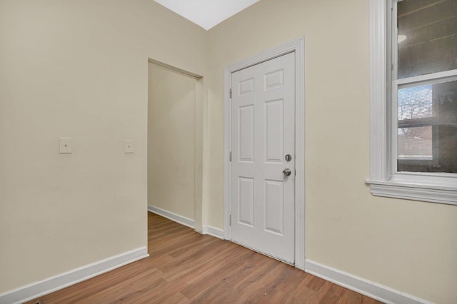 foyer entrance featuring hardwood / wood-style flooring