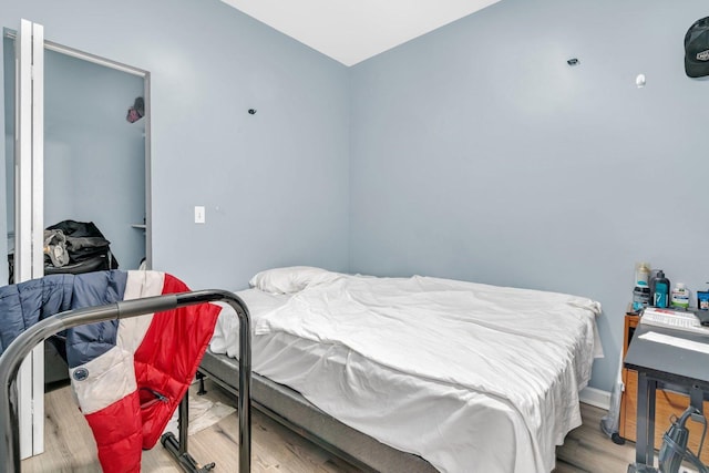 bedroom featuring hardwood / wood-style flooring