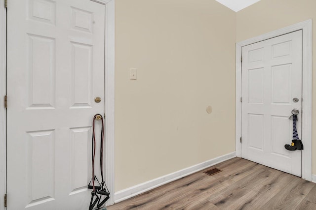 interior space with light hardwood / wood-style flooring