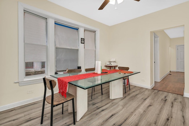 dining area featuring ceiling fan and light hardwood / wood-style floors