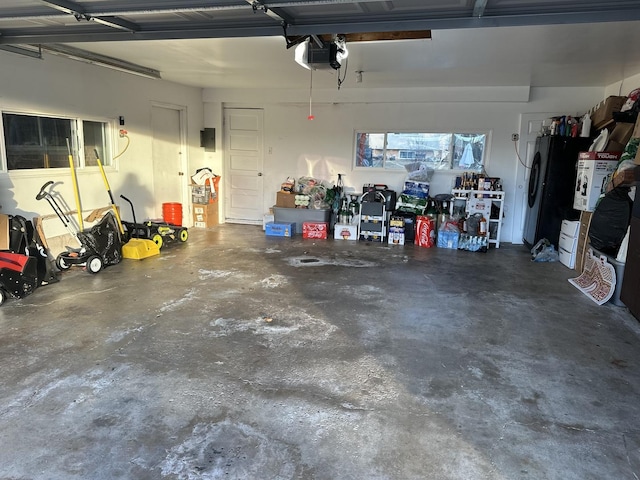 garage featuring a garage door opener