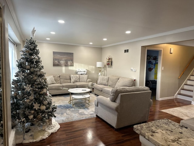 living room featuring crown molding and dark hardwood / wood-style floors