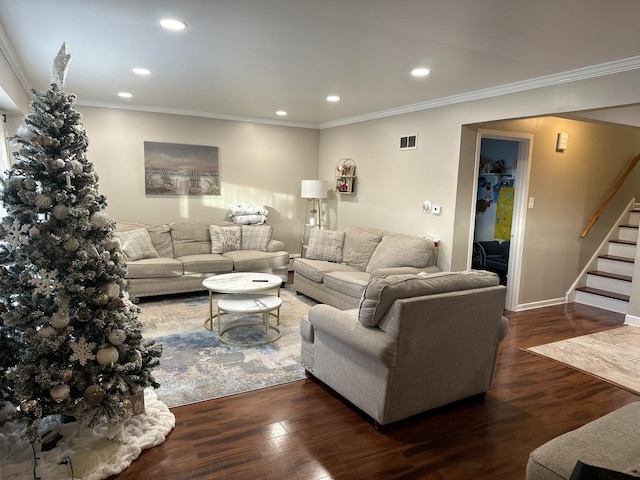 living room with dark wood-type flooring and crown molding