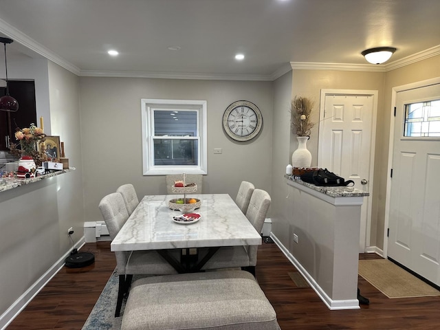 dining space with ornamental molding, dark hardwood / wood-style floors, and a baseboard radiator