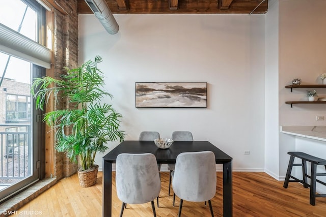 dining area featuring hardwood / wood-style floors