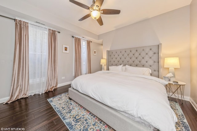 bedroom featuring ceiling fan and dark hardwood / wood-style floors