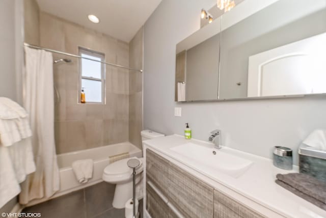 full bathroom with vanity, toilet, and shower / bath combo with shower curtain