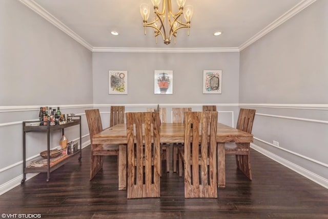 dining room featuring dark hardwood / wood-style flooring, crown molding, and a chandelier