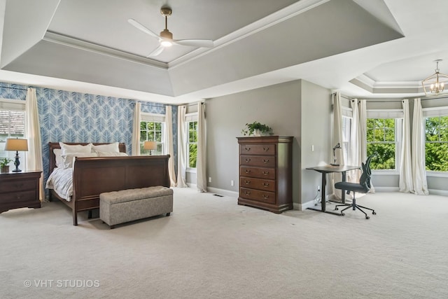 5605 Farmbrook Ln, Crystal Lake, IL 60014 - bedroom with a tray ceiling, wallpapered walls, multiple windows, carpet flooring, and crown molding