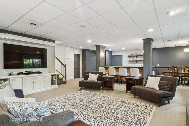 5605 Farmbrook Ln, Crystal Lake, IL 60014 - living area with decorative columns, light colored carpet, stairs, a drop ceiling, and recessed lighting