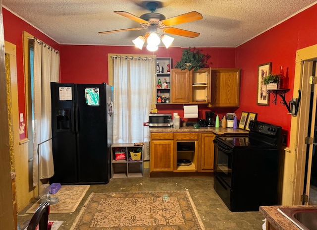 kitchen with ceiling fan, sink, a textured ceiling, and black appliances